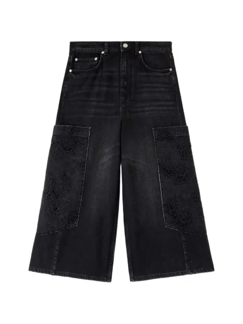 GANNI jeans con bordado floral