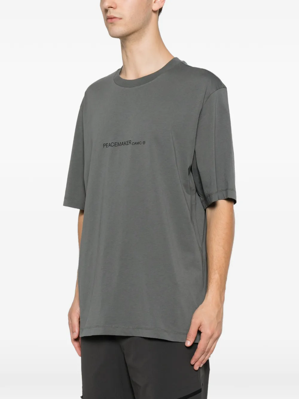 OAMC Peacemaker T-shirt met grafische print Grijs