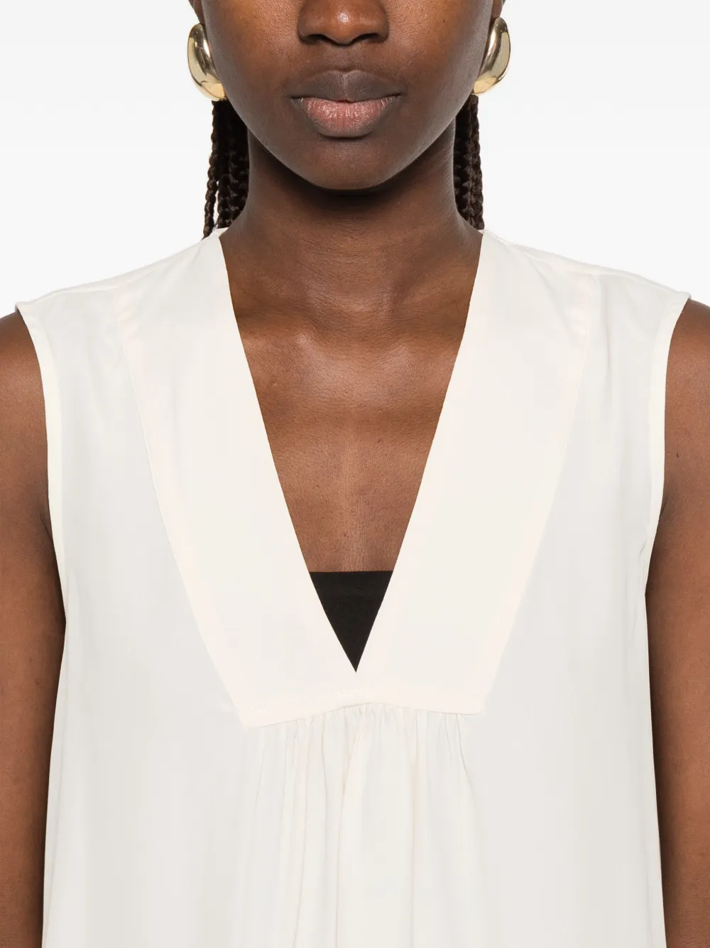 MOMONÌ Juana blouse met V-hals Wit