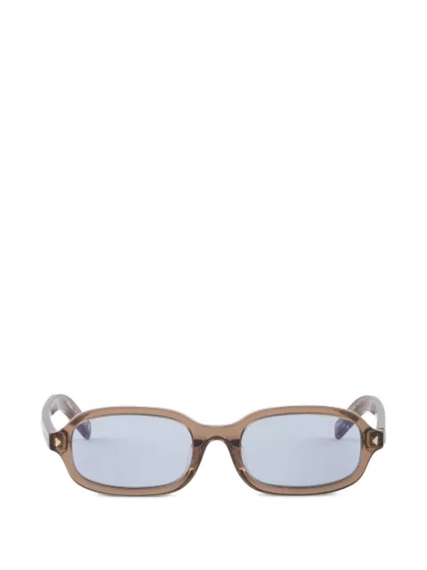 Prada Eyewear sunglasses with the iconic metal plaque
