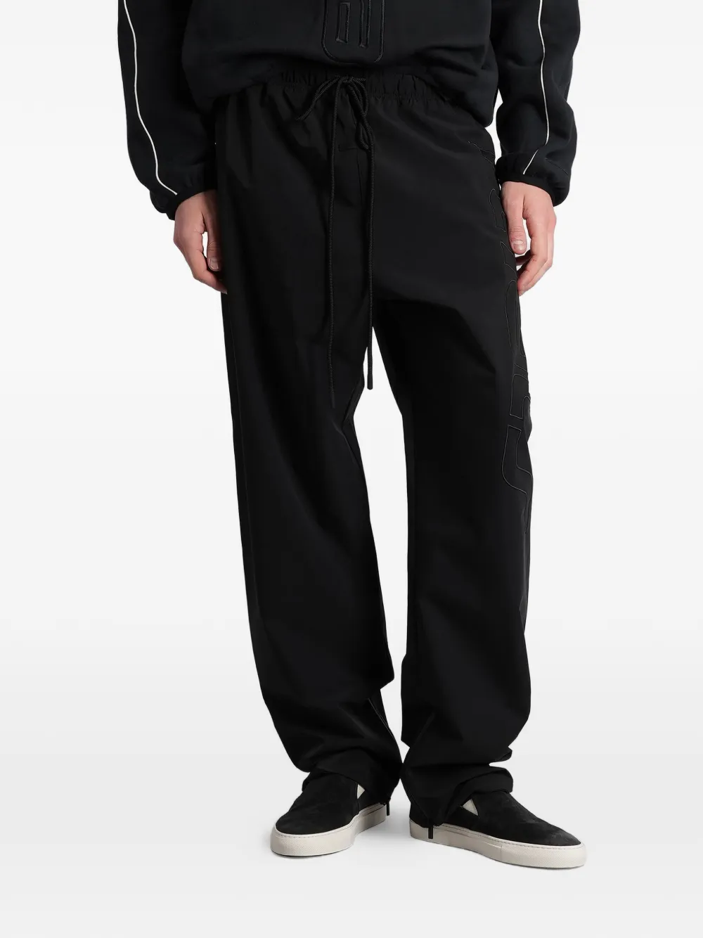 FEAR OF GOD ESSENTIALS Essentials logo-patch track pants - Nero