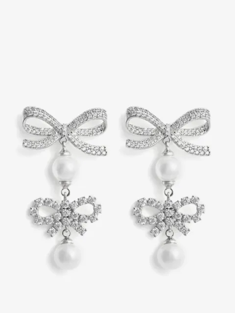 Self-Portrait aretes con doble moño y perla