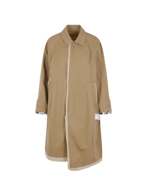 Undercover asymmetric-hem trench coat