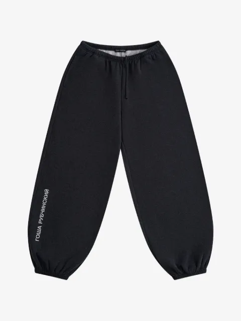 GOSHA RUBCHINSKIY pants con logo estampado