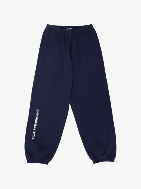 GOSHA RUBCHINSKIY pants con logo estampado
