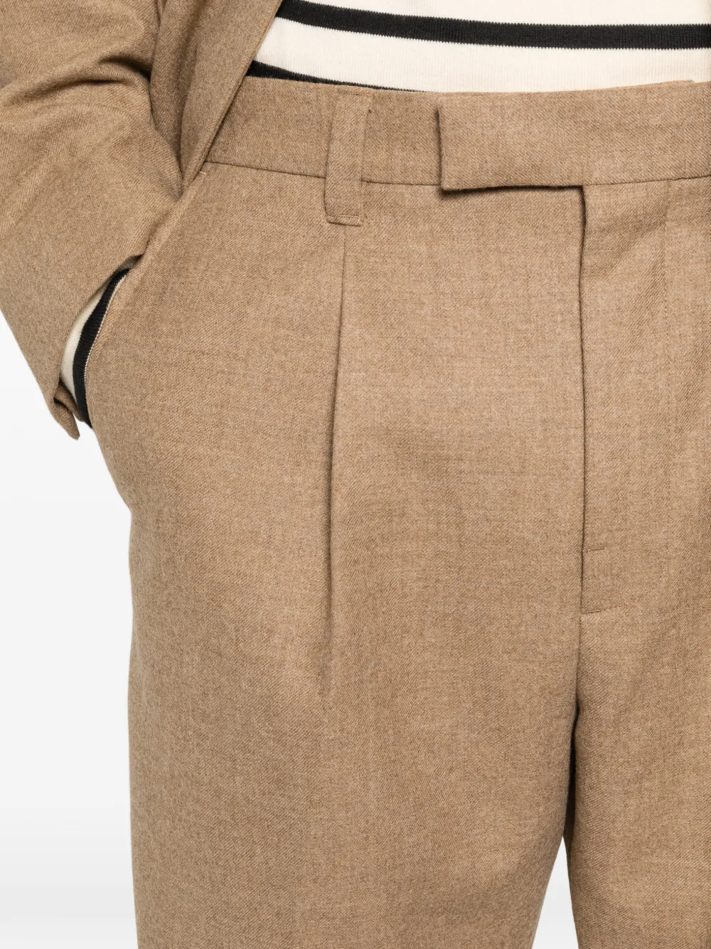 SANDRO Broek met geplooid detail Beige
