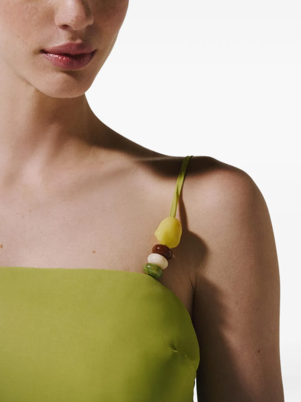 Baobab Noa mouwloze blouse met asymmetrische zoom Groen