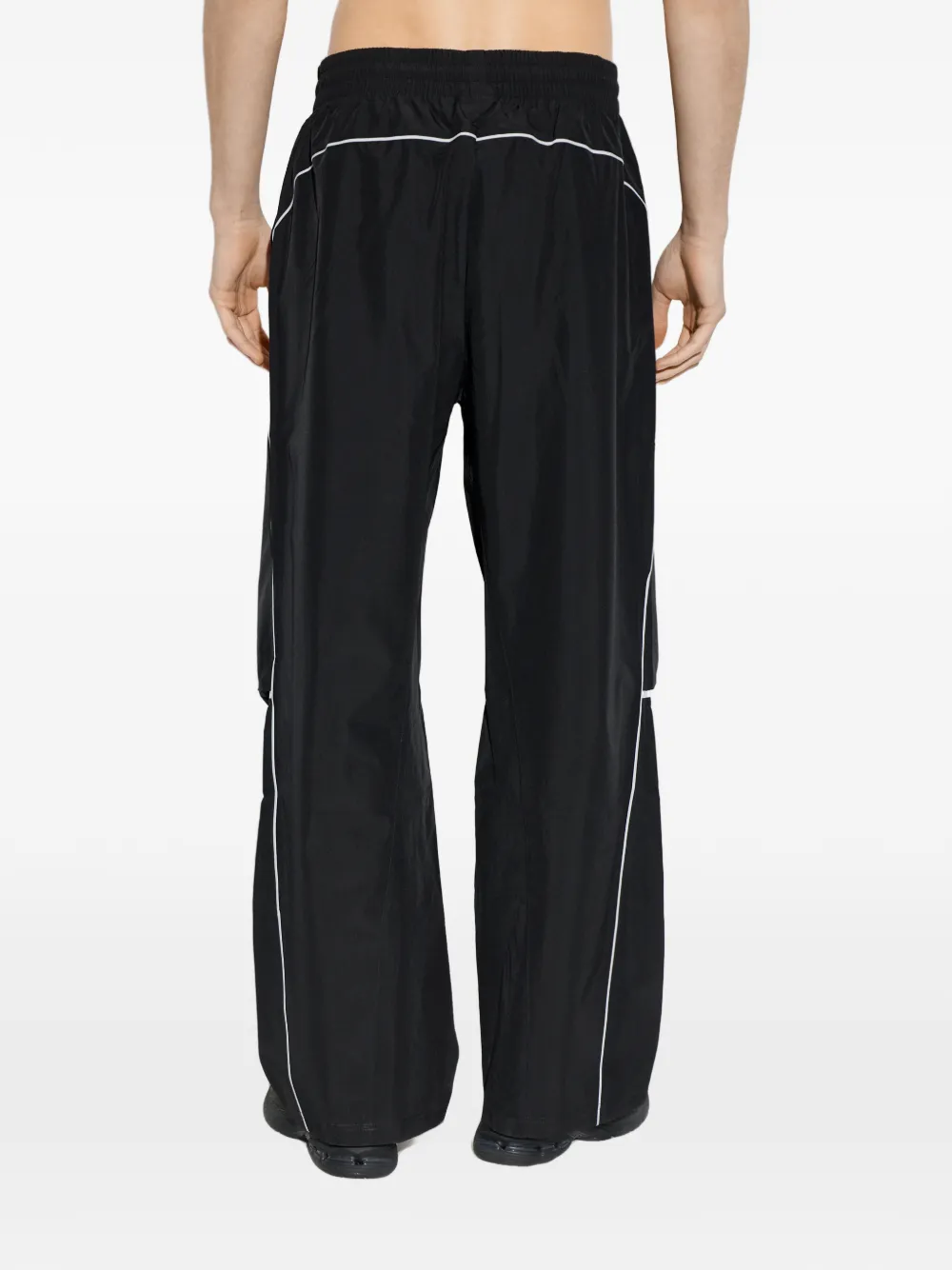 New Balance Broek met afwerking en logoprint Zwart