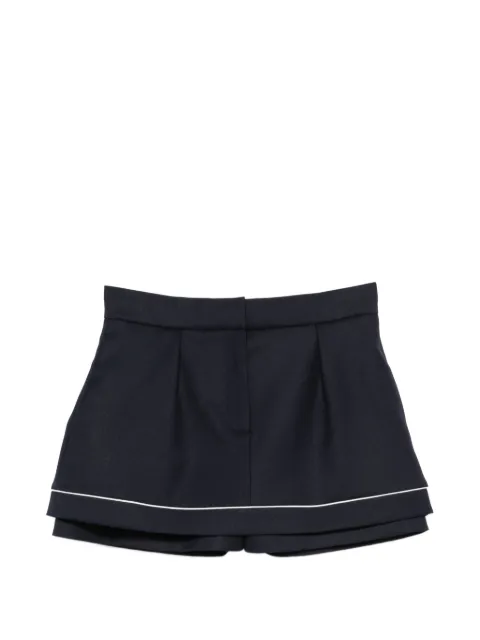 Maje shorts con ribete
