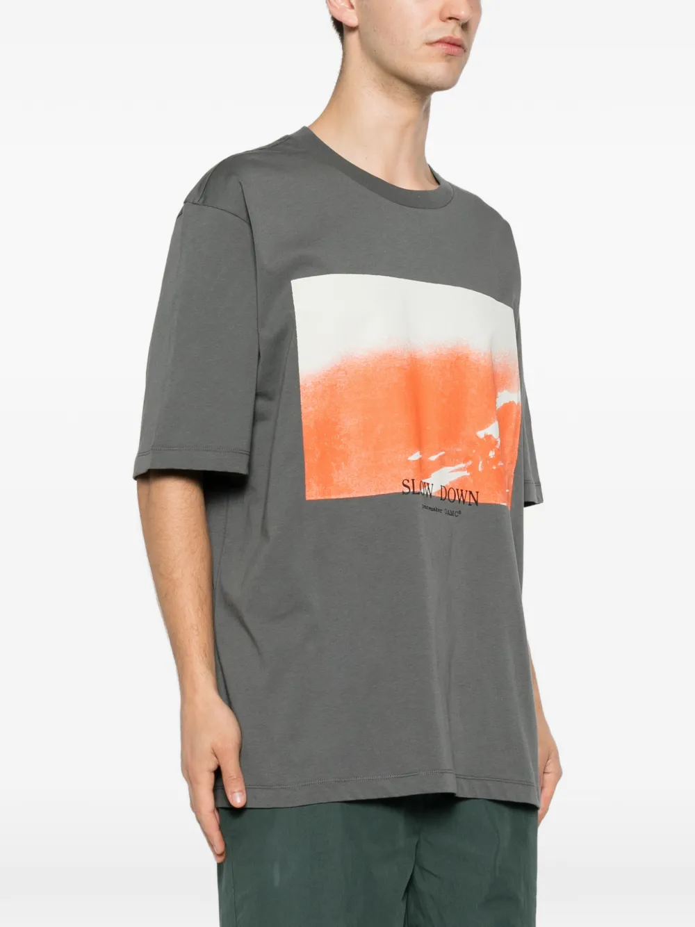 OAMC Peacemaker Slow Down T-shirt met grafische print Grijs
