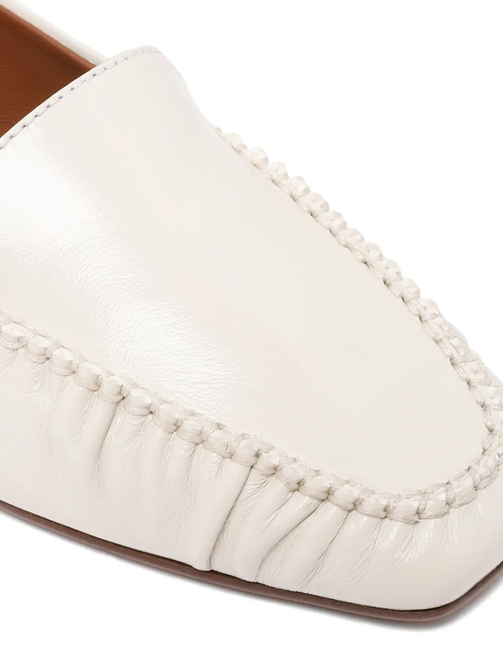 Pollini whipstitch-trim loafers Beige