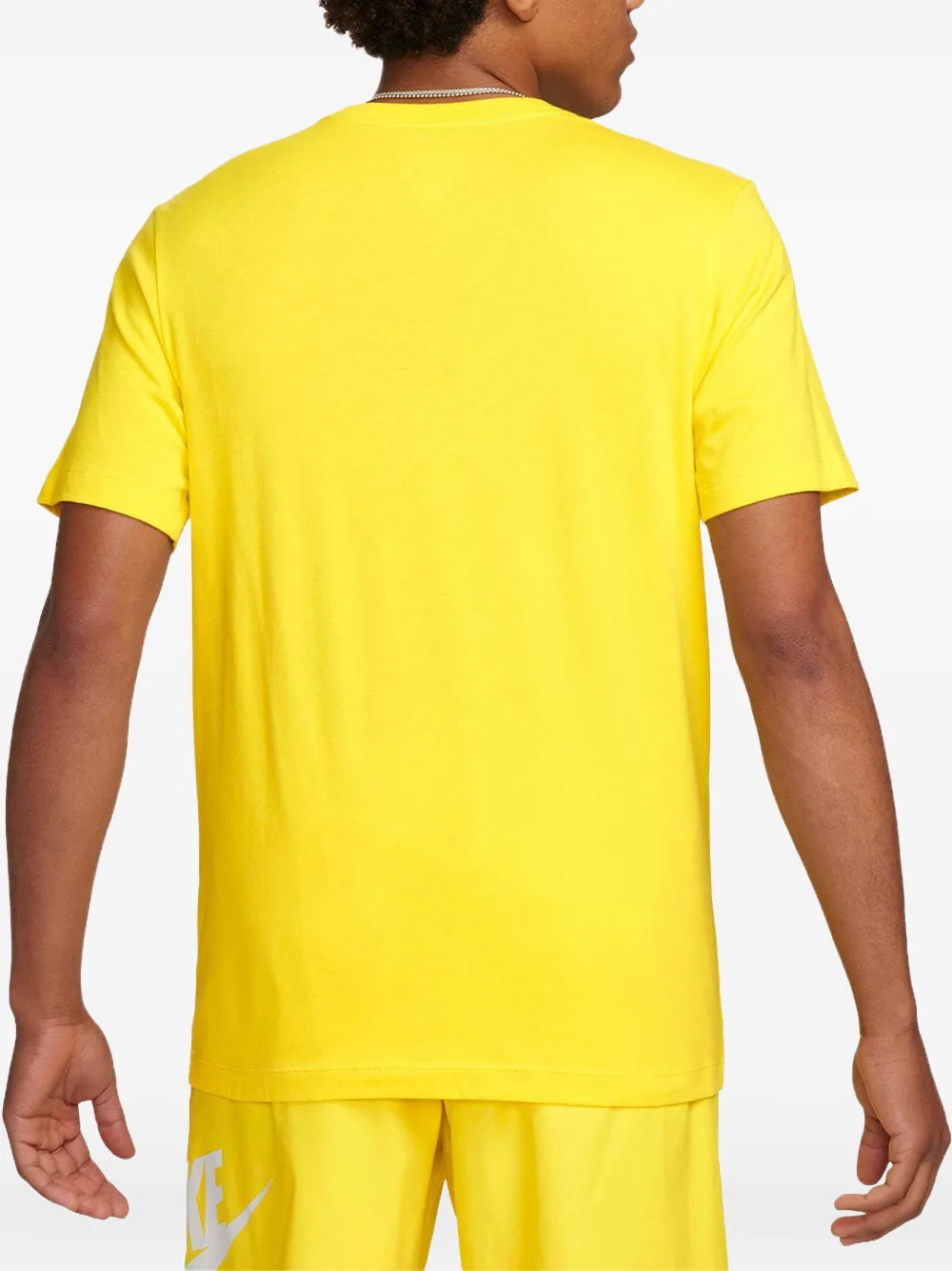 Nike T-shirt met print Geel