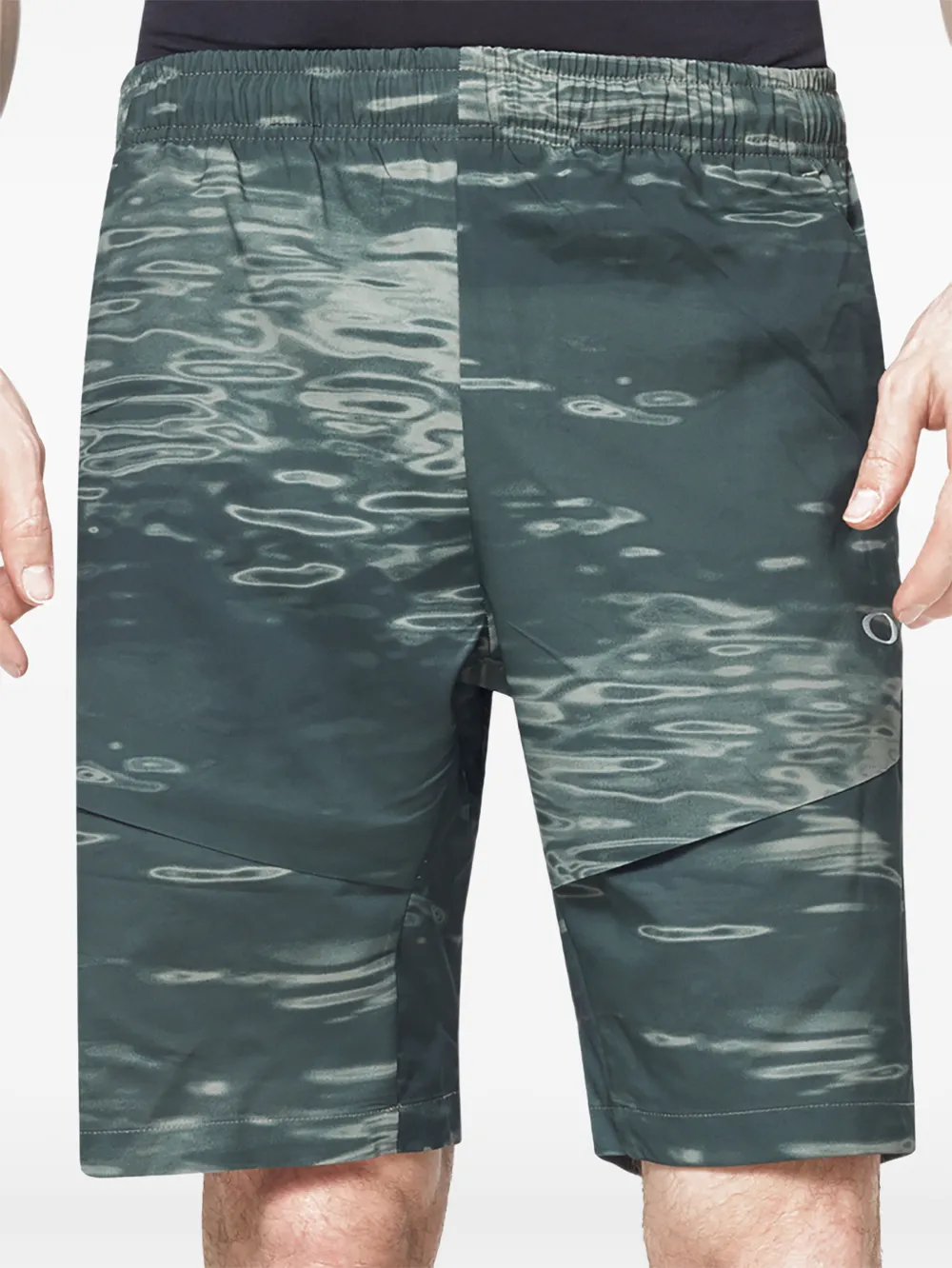 Oakley Enhance Mobility shorts met print Groen