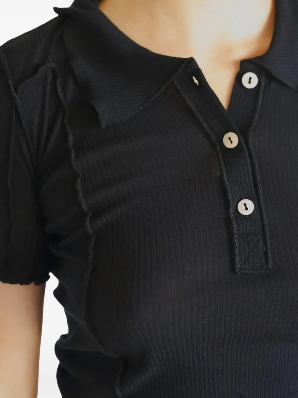 Baserange Omato ribgebreid polo T-shirt Zwart