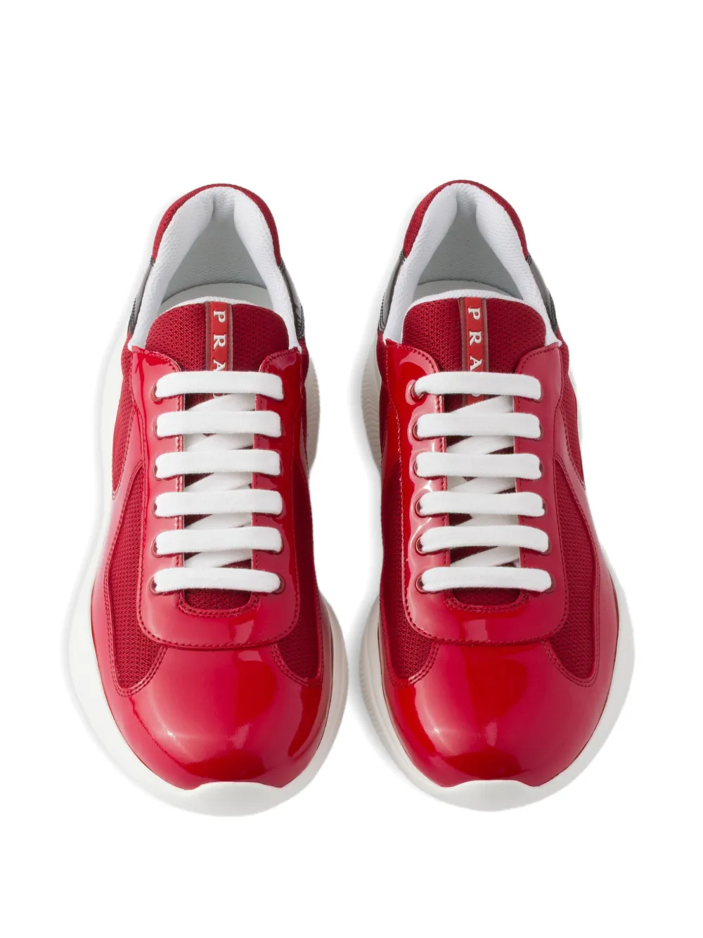 Prada America's Cup sneakers van lakleer en technische stof Rood