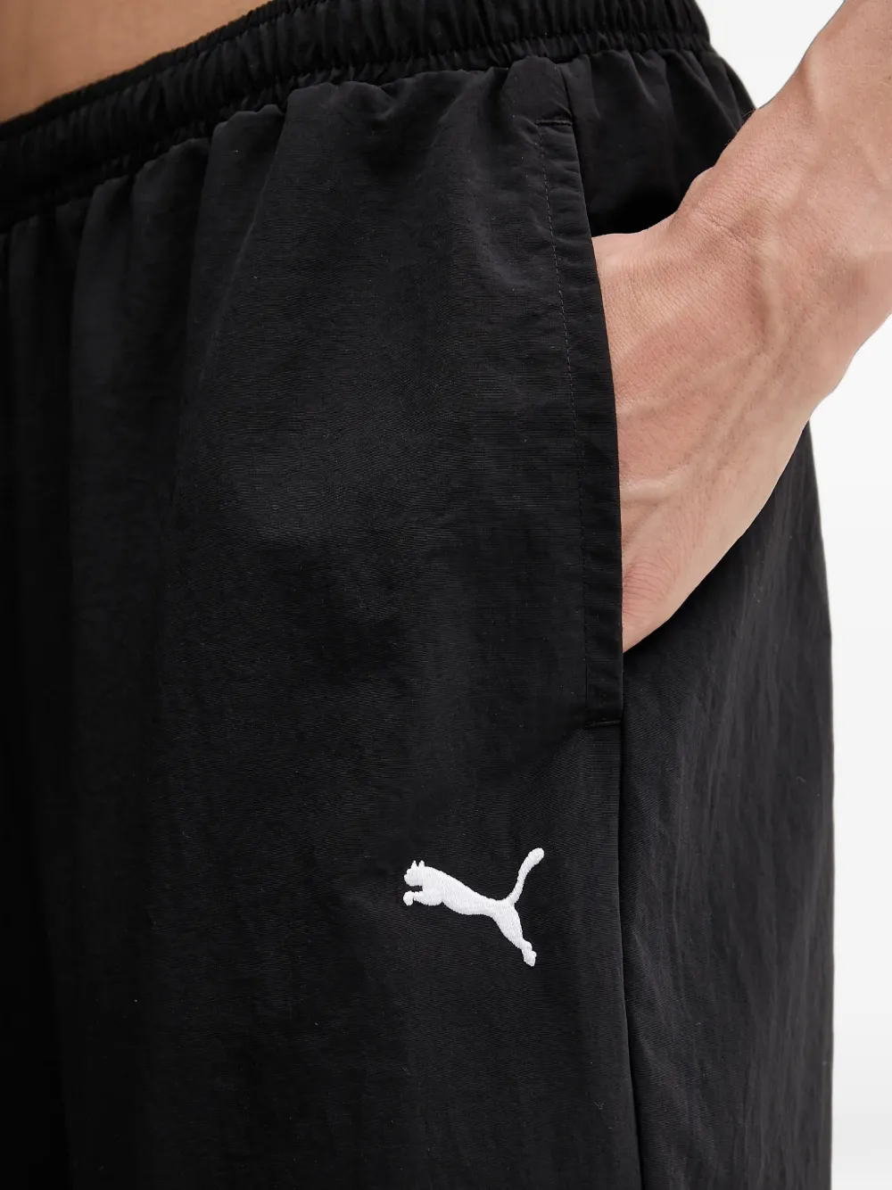 PUMA Trainingsbroek met geborduurd logo Zwart