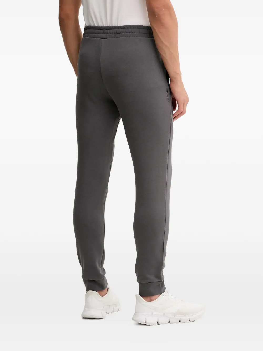 PUMA Trainingsbroek met logoprint Grijs