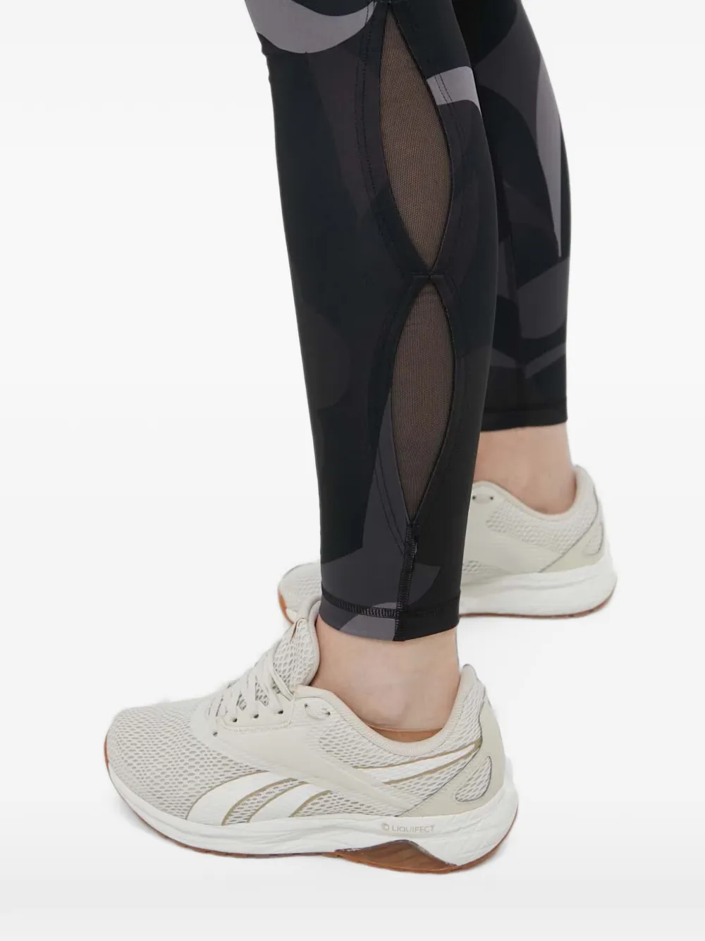 PUMA Legging met mesh vlakken en abstracte print Zwart