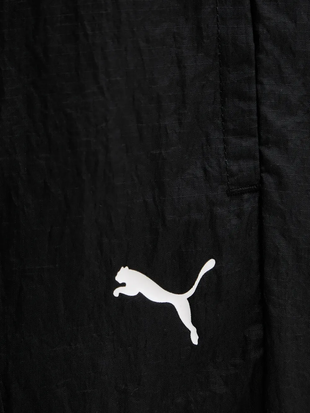 PUMA Trainingsbroek met logoprint Zwart