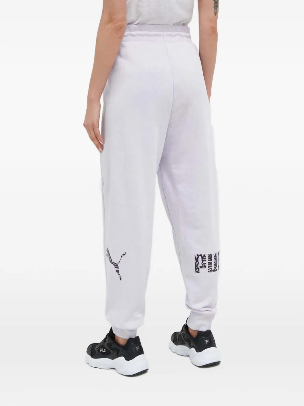 PUMA Trainingsbroek met logoprint Paars