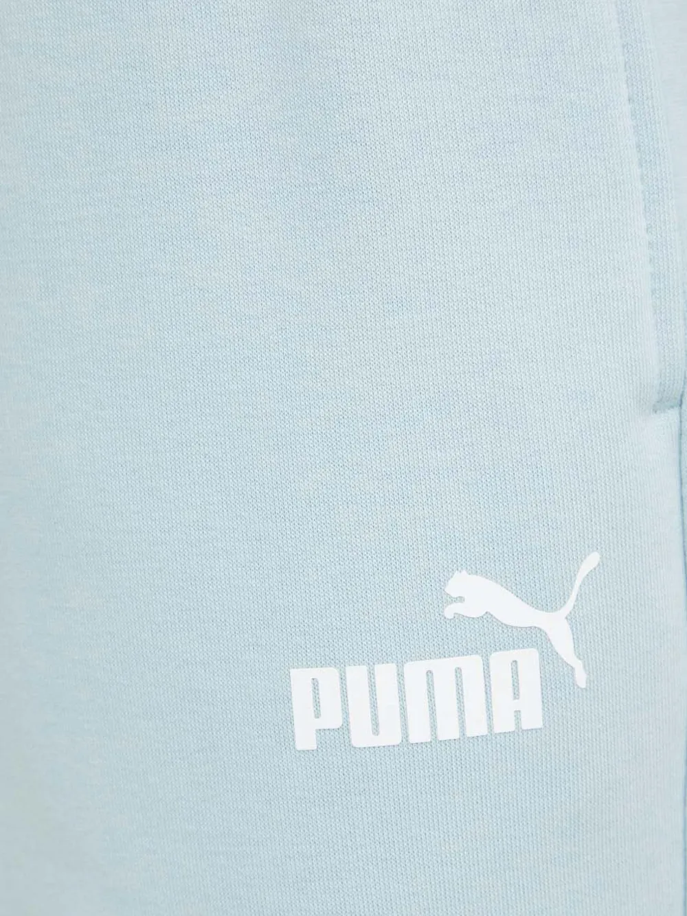 PUMA Trainingsbroek met logoprint Blauw