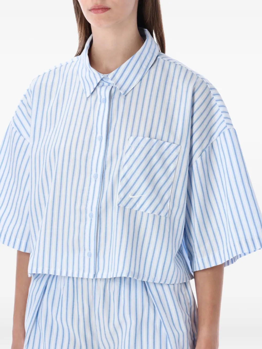 Nike Chill Popeline cropped blouse met strepen Blauw