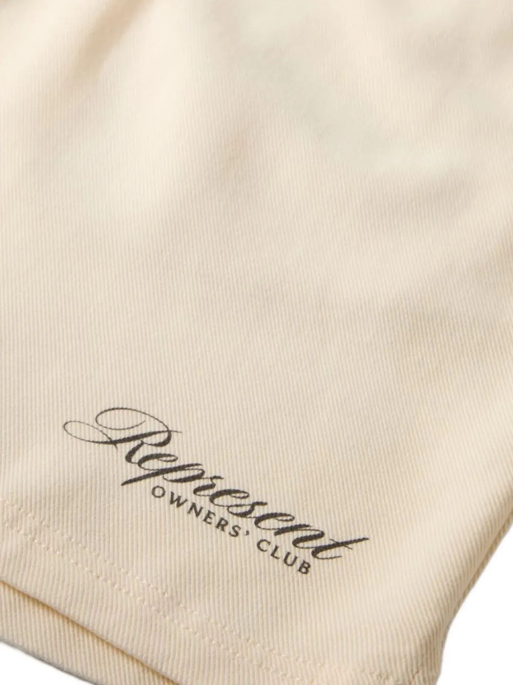 Represent Owners Club trainingsshorts met print Beige