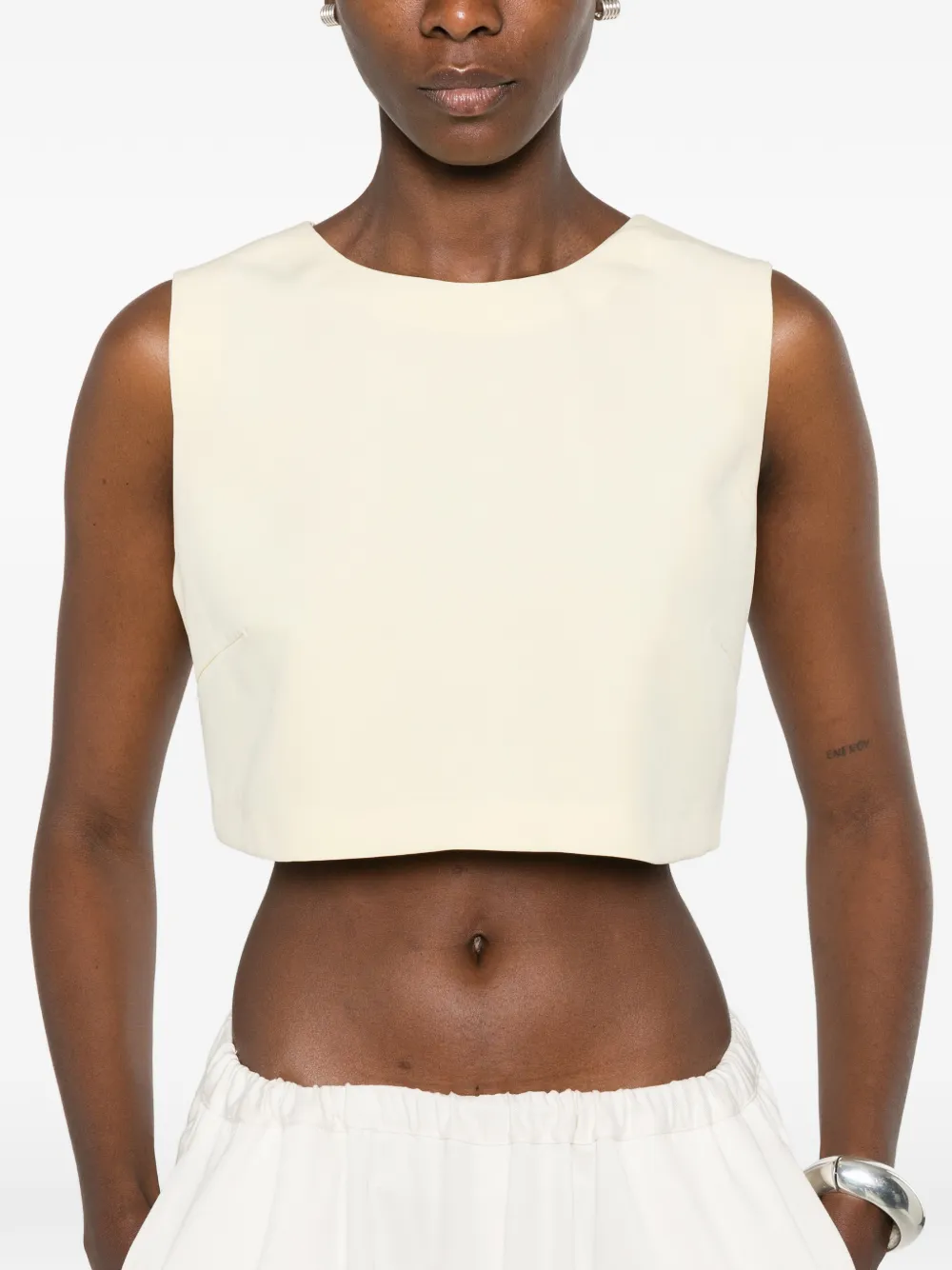 CARLA G. Vaud cropped mouwloze top Geel
