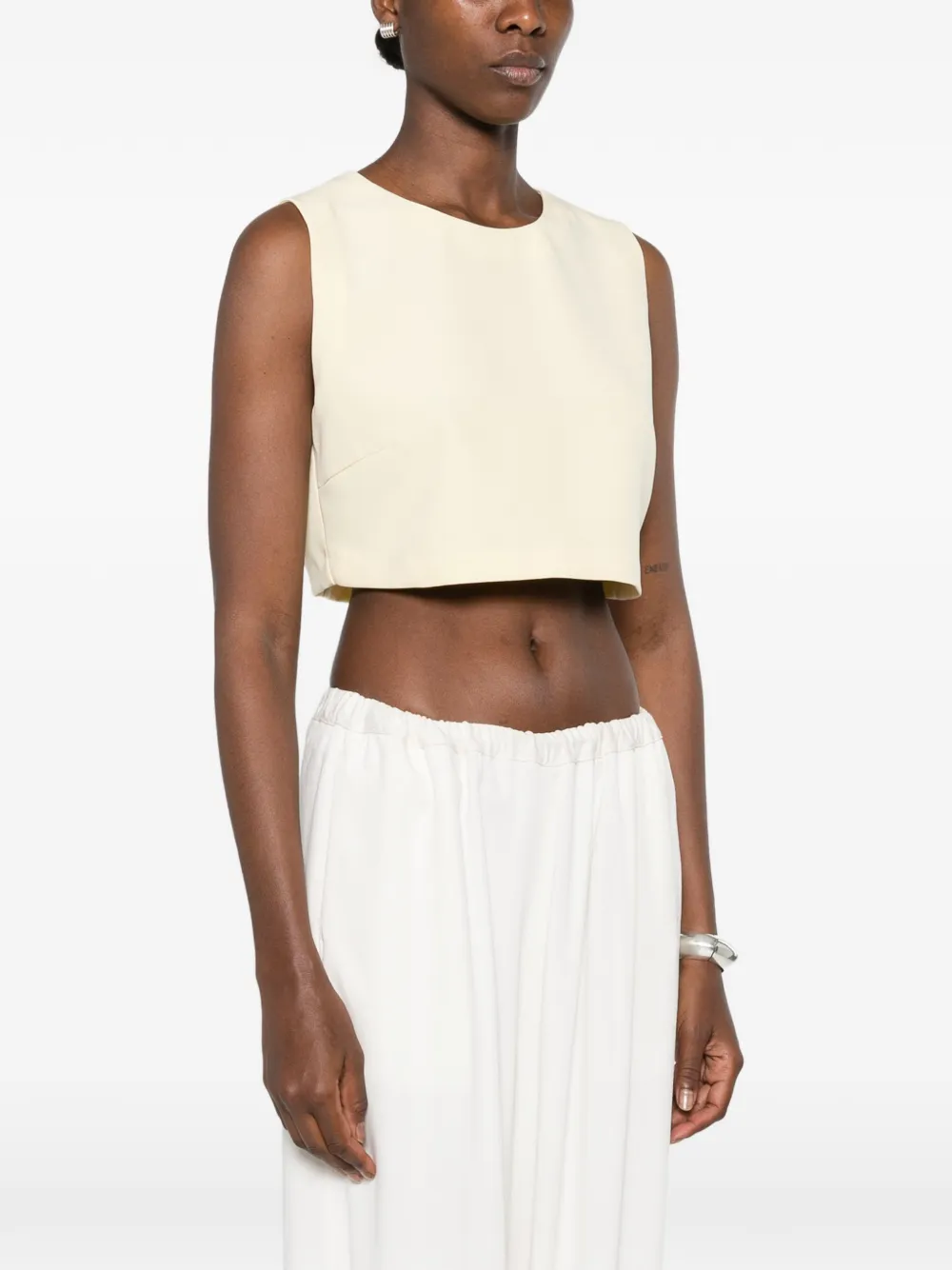 CARLA G. Vaud cropped mouwloze top Geel