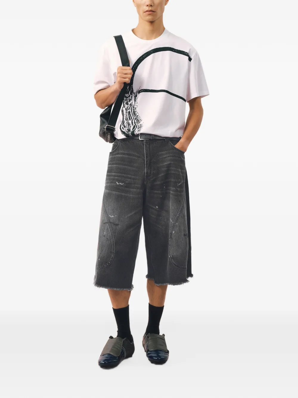 CROQUIS Denim shorts met franje en verfspatten Zwart