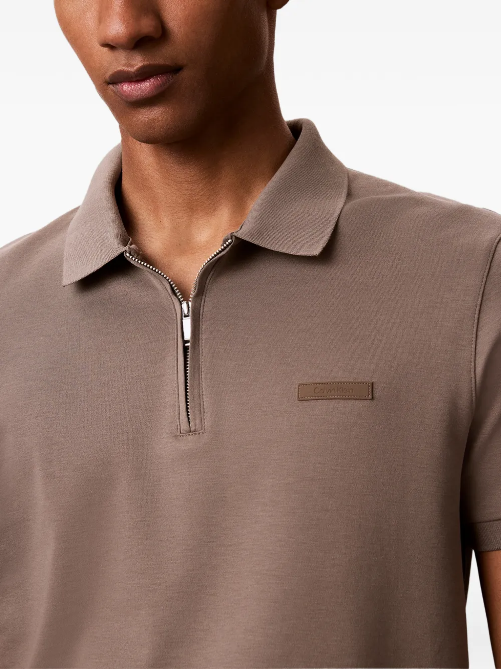 Calvin Klein Poloshirt met logopatch en rits Bruin