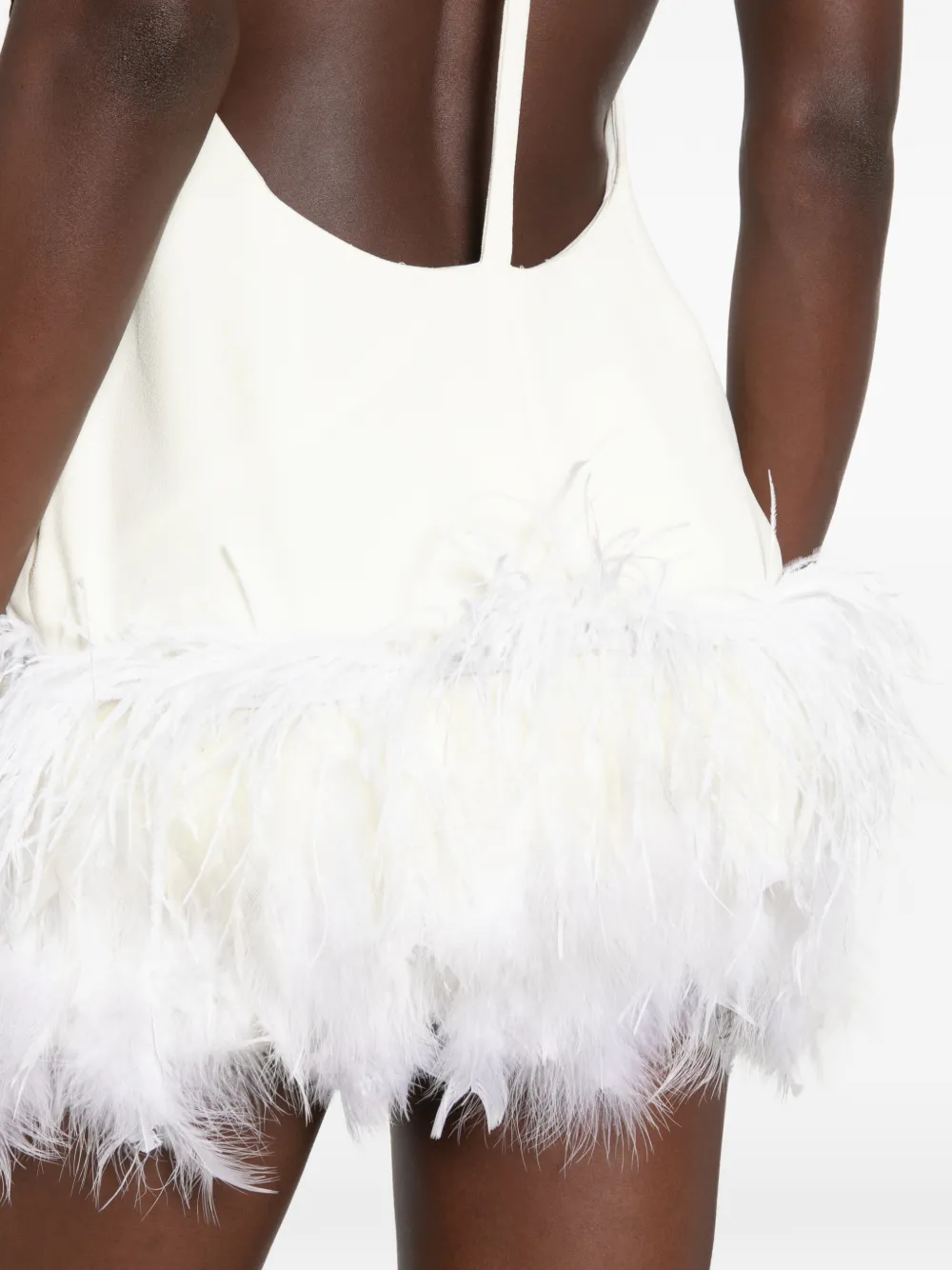 Vestiaire d'un Oiseau Libre Jurk met open achterkant en veren afwerking Beige