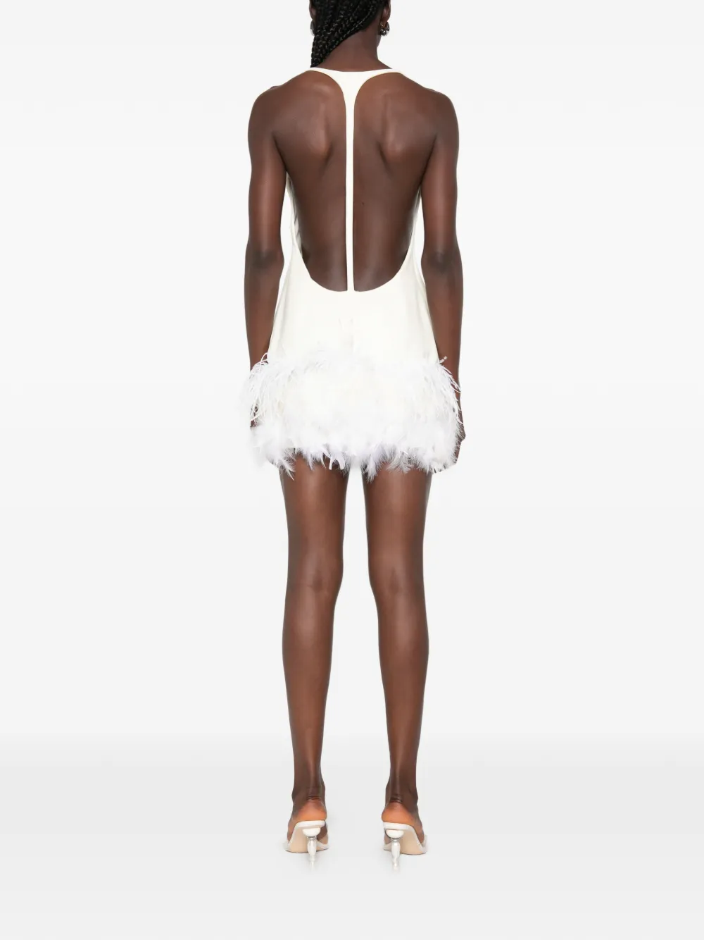 Vestiaire d'un Oiseau Libre Jurk met open achterkant en veren afwerking Beige