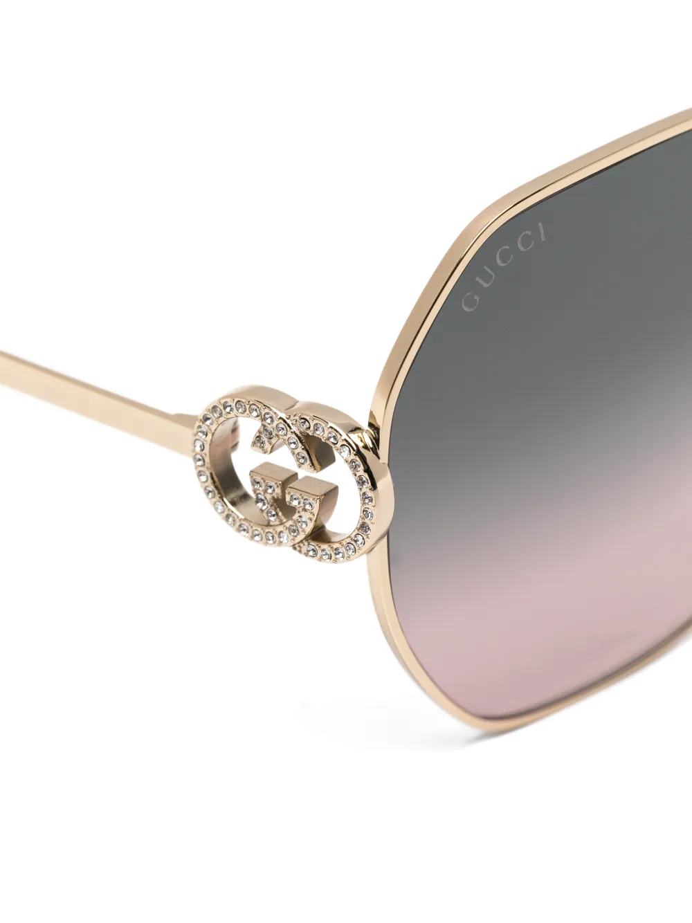 Gucci Eyewear Zonnebril met geometrisch montuur en GG-logo verfraaid met kristallen Goud