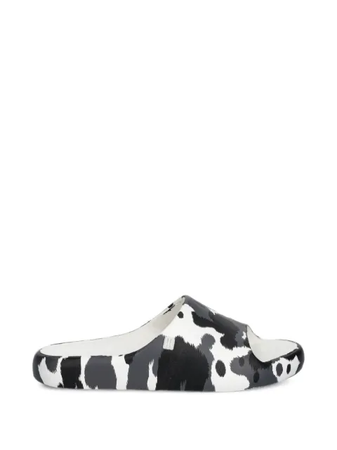 Melissa flip flops Free con estampado de vaca