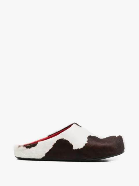 Marni mules con vaca estampada