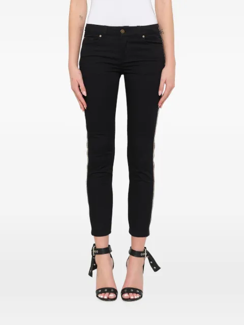 Alexander McQueen jeans con detalle de cierre