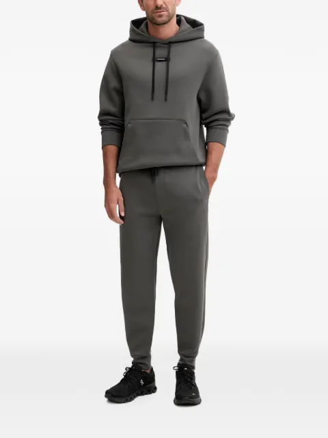 On drawstring track tech pants