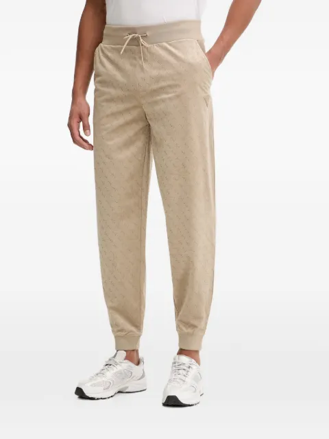 GUESS USA monogram-pattern track pants