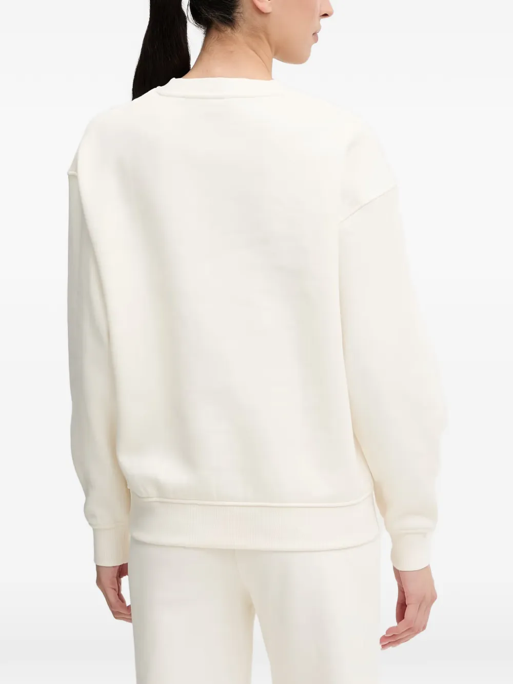 GUESS USA Nat sweater met logoplakkaat en verlaagde schouders Beige