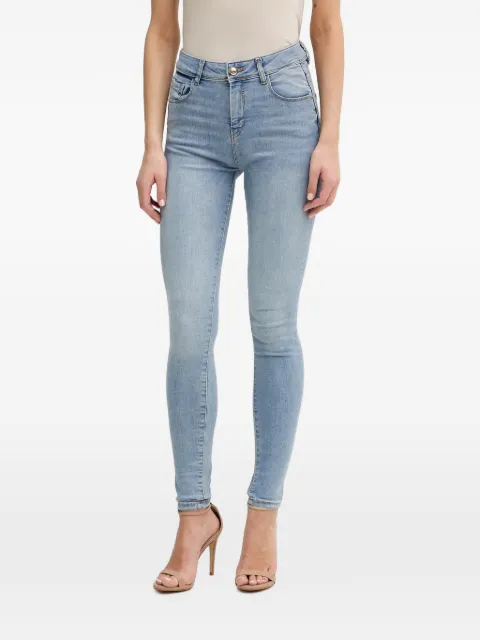 Gaudi skinny jeans con efecto envejecido