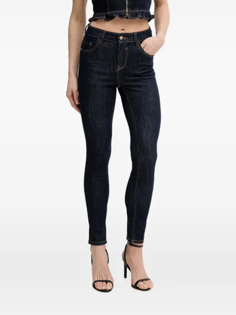 Gaudi jeans con placa del logo