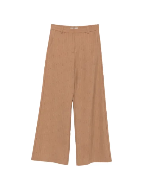 Maje pantalones con estampado de rayas diplomáticas