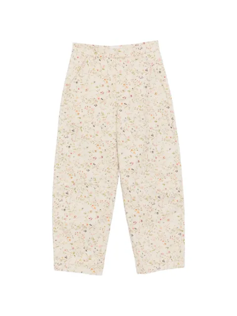 Tela pantalones con estampado floral