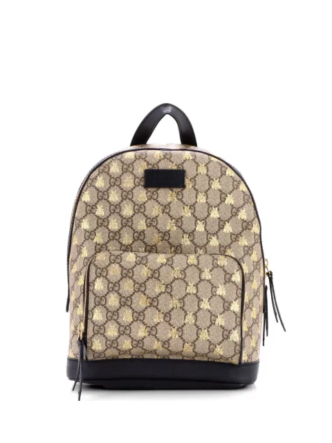 Gucci Pre-Owned mochila pequeña de lona GG revestida con cierre y estampado 