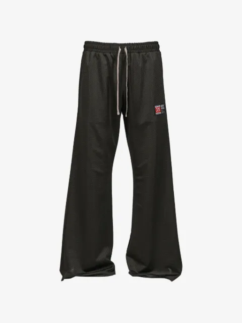 JUN/NAKAYAMA pantalon de jogging en résille à patch logo