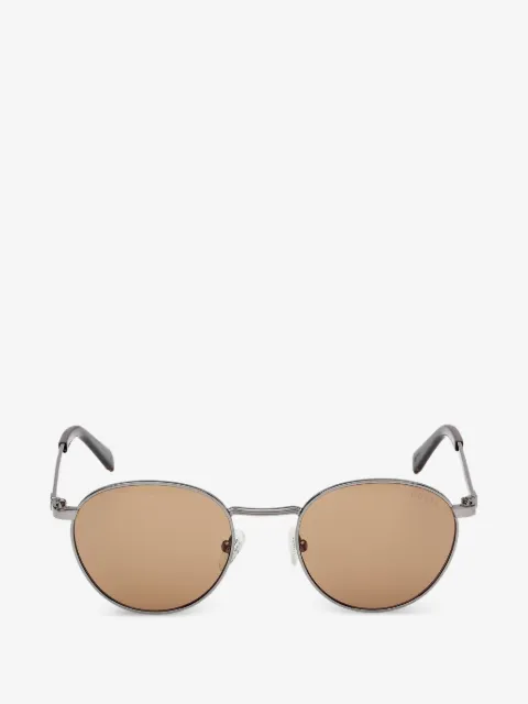 GUESS EYEWEAR lunettes de soleil à logo gravé