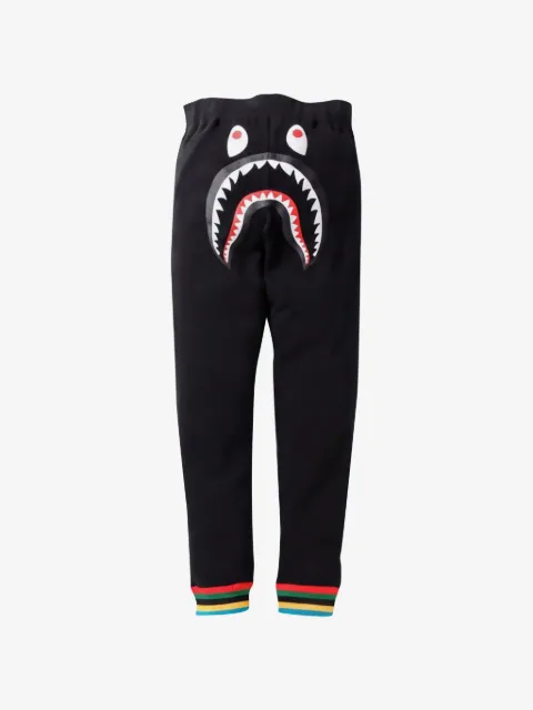 A BATHING APE® shark-print track pants