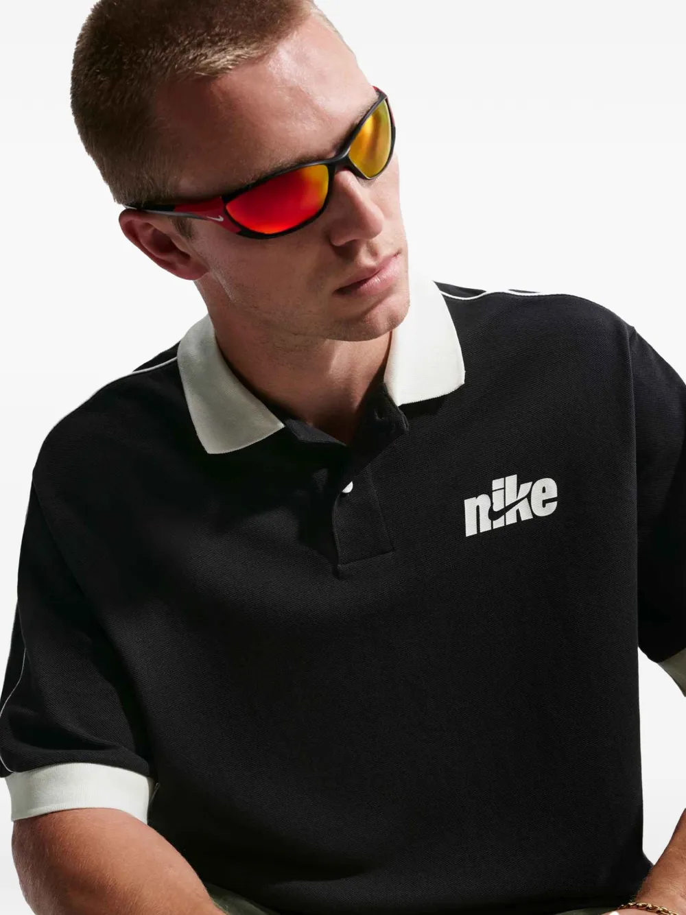 Nike logo-print piped polo shirt Zwart