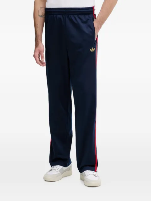 adidas pants Firebird con logo bordado y rayas laterales